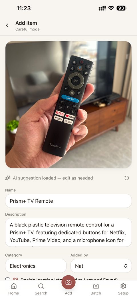 OsoFind add-item screen with AI-suggested name and category for a photographed TV remote